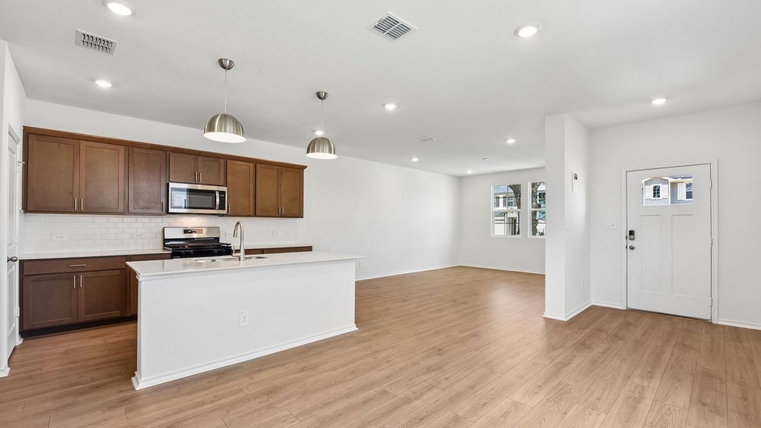 Furnished interior view inside a new home in Valverde, Bastrop (Image 8).