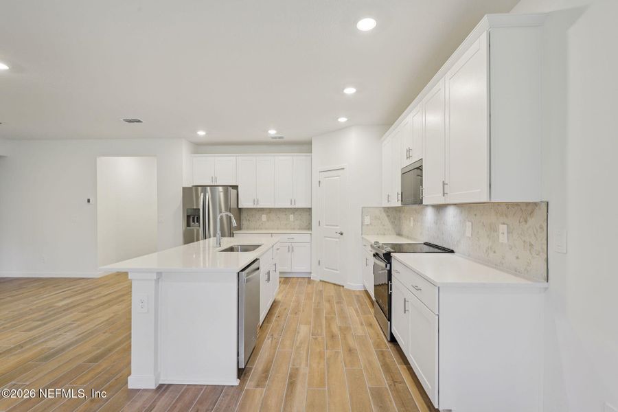 Furnished interior view inside a new home in Colbert Landings, Palm Coast (Image 4).