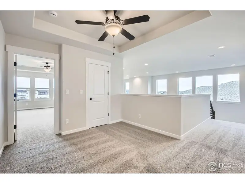 Spacious, unfurnished interior of a new home in RainDance, Windsor (Image 24).
