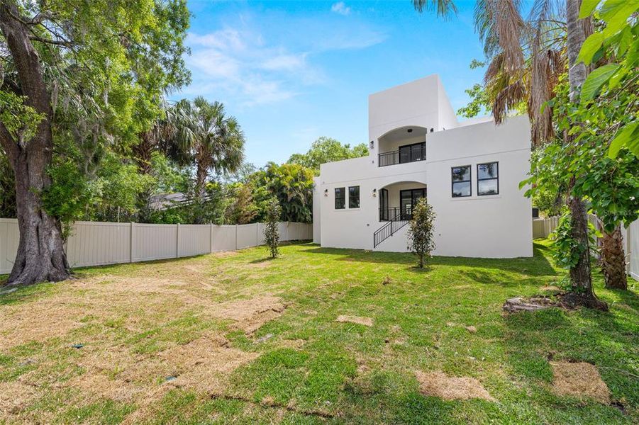 Front exterior of a new home in , Tampa, FL, highlighting curb appeal (Image 26).
