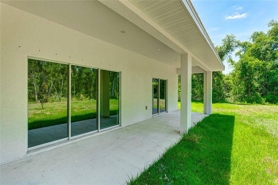 Exterior details and patio area of a home in , North Port (Image 22).