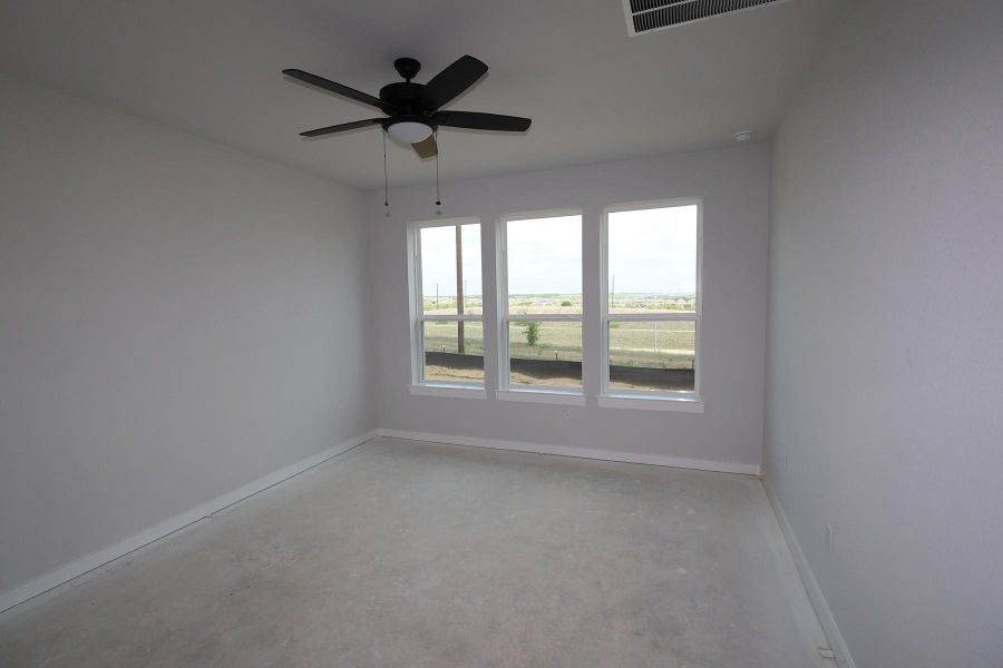 Spacious, unfurnished interior of a new home in Terrace Collection At Turner's Crossing, Buda (Image 8).