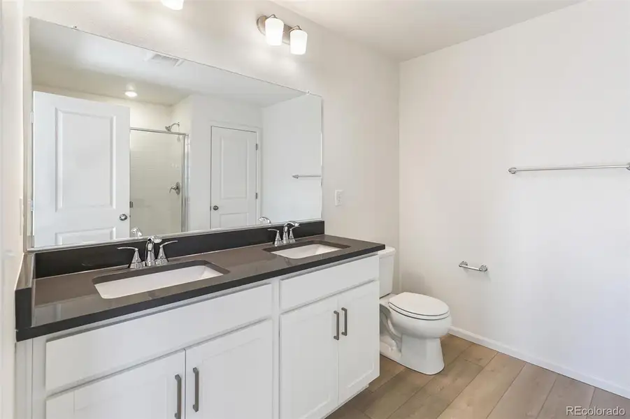 Furnished interior view inside a new home in Turnberry, Commerce City (Image 13).