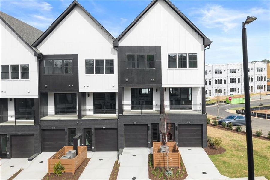 Front exterior of a new home in , Alpharetta, GA, highlighting curb appeal (Image 23). Front exterior of a new home in , Alpharetta, GA, highlighting curb appeal (Image 23).