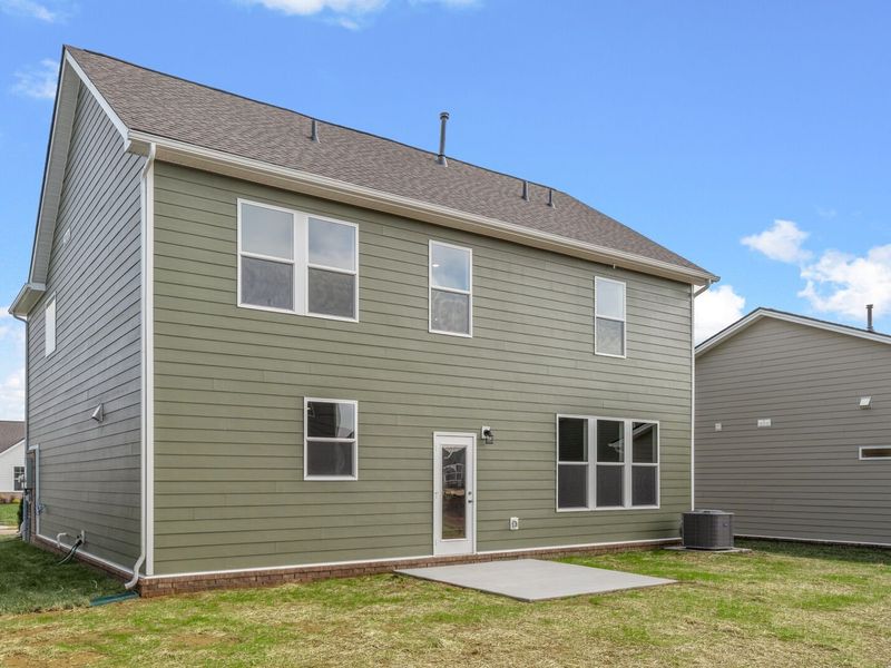 Exterior details and patio area of a home in Sage Farms, White House (Image 22).