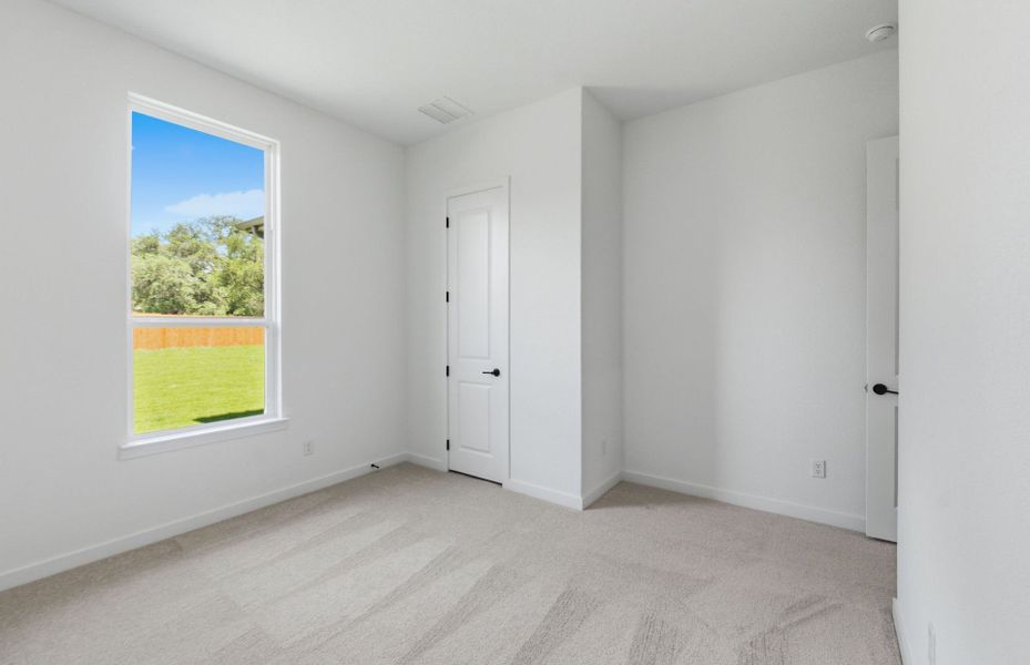 Spacious, unfurnished interior of a new home in 6 Creeks, Kyle (Image 34).