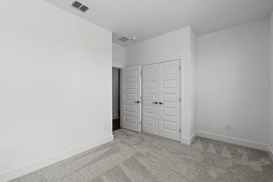 Representative unfurnished interior of a home built from the Newton by Rockwell Homes in Harvest at Ovation - Townhomes, Winter Garden (Image 61). Representative unfurnished interior of a home built from the Newton by Rockwell Homes in Harvest at Ovation - Townhomes, Winter Garden (Image 61).