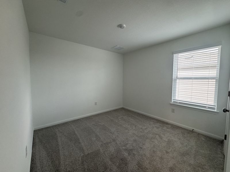 Spacious, unfurnished interior of a new home in Longview 40s - Alley, Del Valle (Image 9).