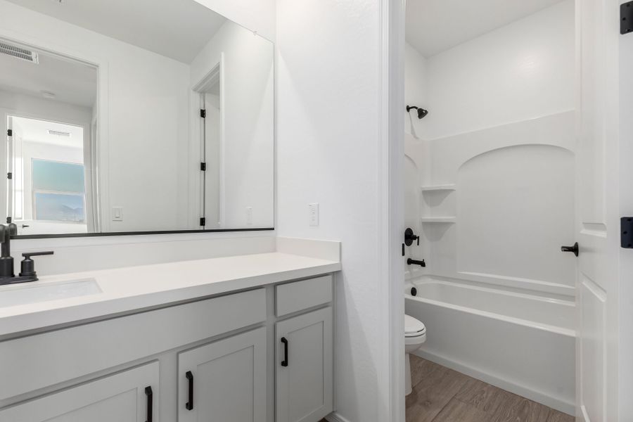 Furnished interior view inside a new home in Bella Vista Farms, San Tan Valley (Image 8).