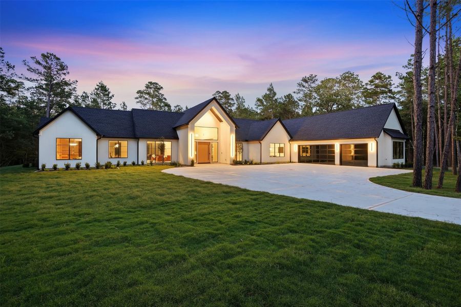 Front exterior of a new home in , Montgomery, TX, highlighting curb appeal (Image 21).