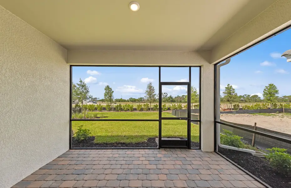 Exterior details and patio area of a home in Del Webb Oak Creek, North Fort Myers (Image 3).
