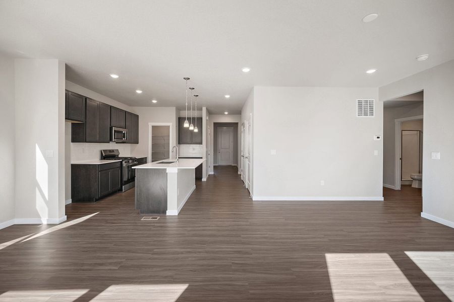 Spacious, unfurnished interior of a new home in Ridge at Lorson Ranch, Colorado Springs (Image 24).