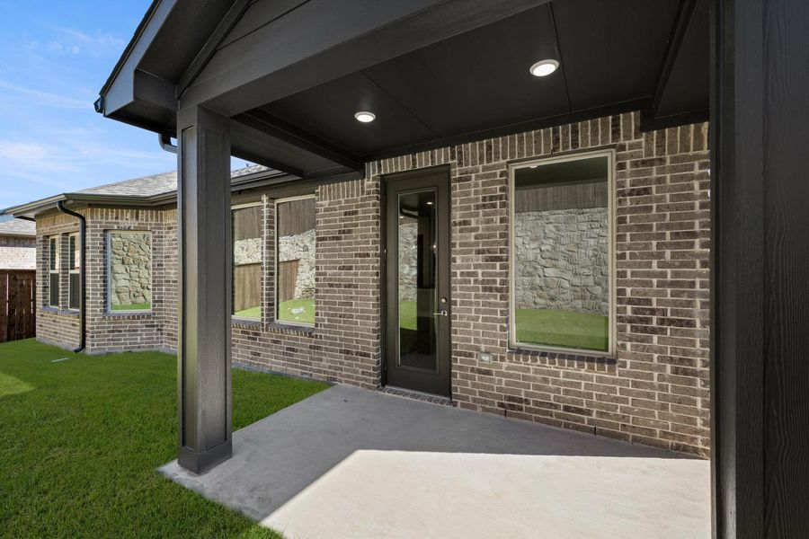 Exterior details and patio area of a home in Discovery Collection at Bridgewater, Midlothian (Image 3).