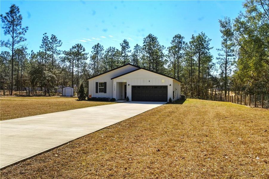 Front exterior of a new home in , Ocala, FL, highlighting curb appeal (Image 22).