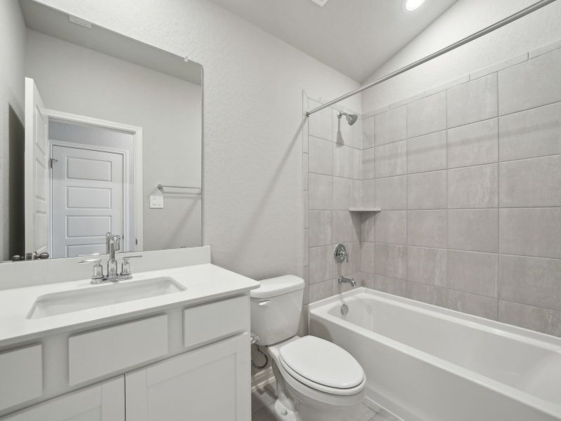 Guest bathroom in the Briscoe floorplan at a Meritage Homes community. Guest bathroom in the Briscoe floorplan at a Meritage Homes community.