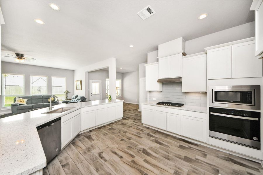 Furnished interior view inside a new home in Elm Estates, Angleton (Image 13).