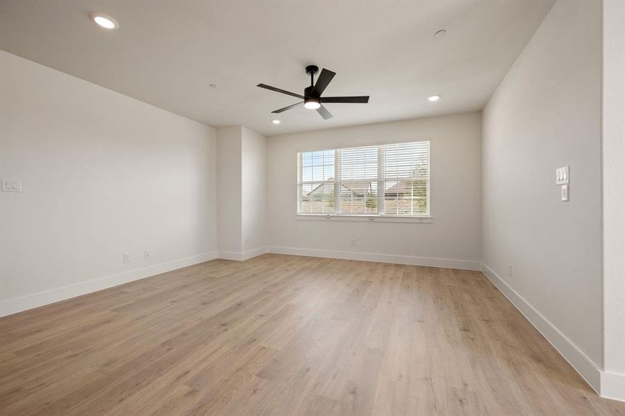 You'll find a light filled family room that the entire family will enjoy in our Camille II plan!