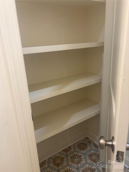 Main level wood shelving in linen Main level wood shelving in linen