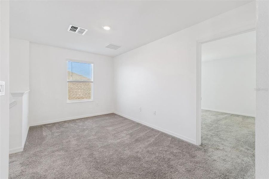 Spacious, unfurnished interior of a new home in Peace Creek Reserve: Legacy Collection, Winter Haven (Image 18). Spacious, unfurnished interior of a new home in Peace Creek Reserve: Legacy Collection, Winter Haven (Image 18).