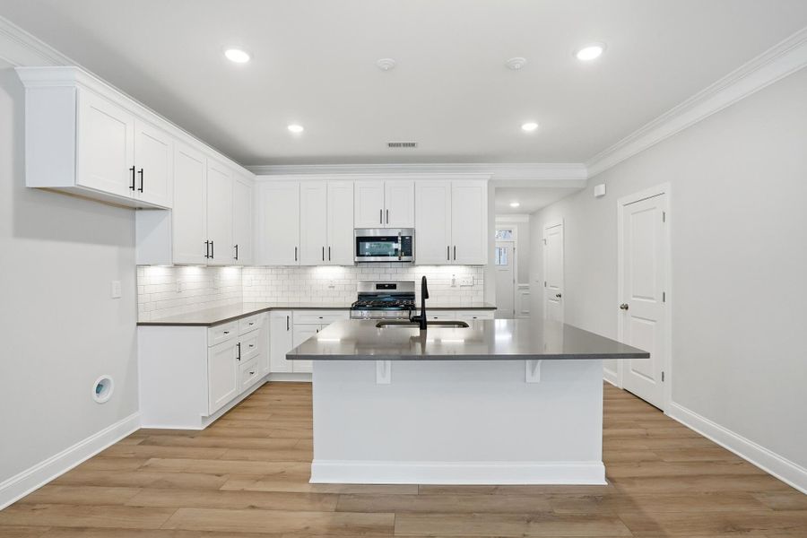 Furnished interior view inside a new home in Harrisburg Village Townhomes, Harrisburg (Image 10).