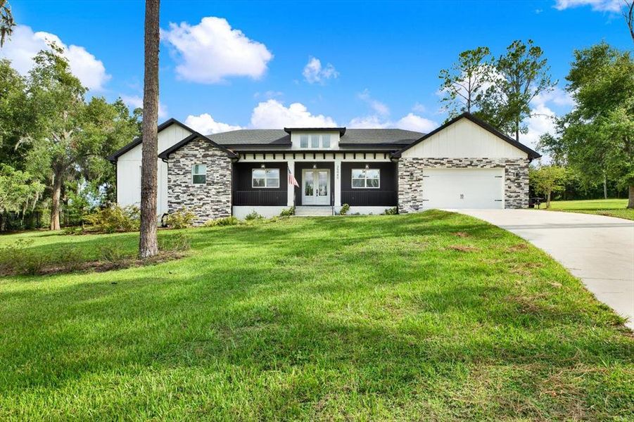 Front exterior of a new home in , Dade City, FL, highlighting curb appeal (Image 2). Front exterior of a new home in , Dade City, FL, highlighting curb appeal (Image 2).