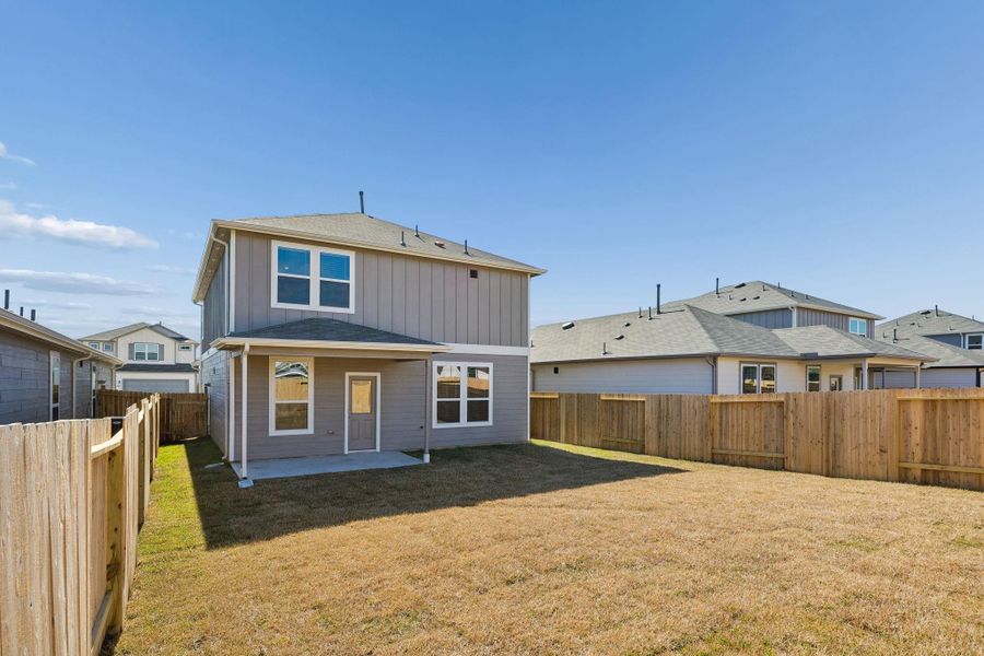 Exterior details and patio area of a home in Decker Farms, Magnolia (Image 3).