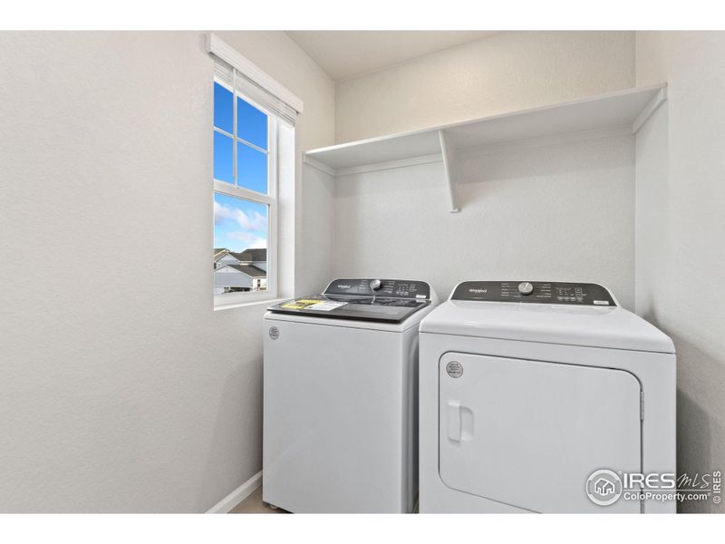 upstairs laundry with washer and dryer included.