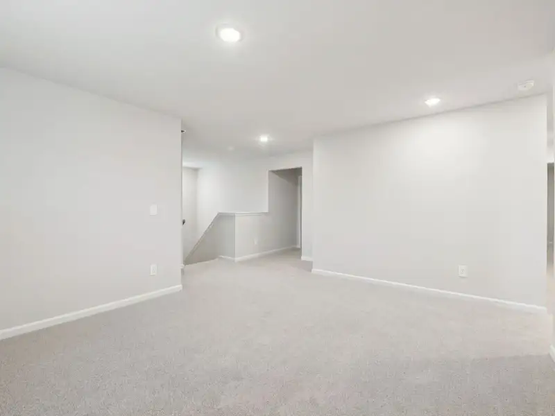 Spacious, unfurnished interior of a new home in Country Lane - Signature Series, Clayton (Image 14).