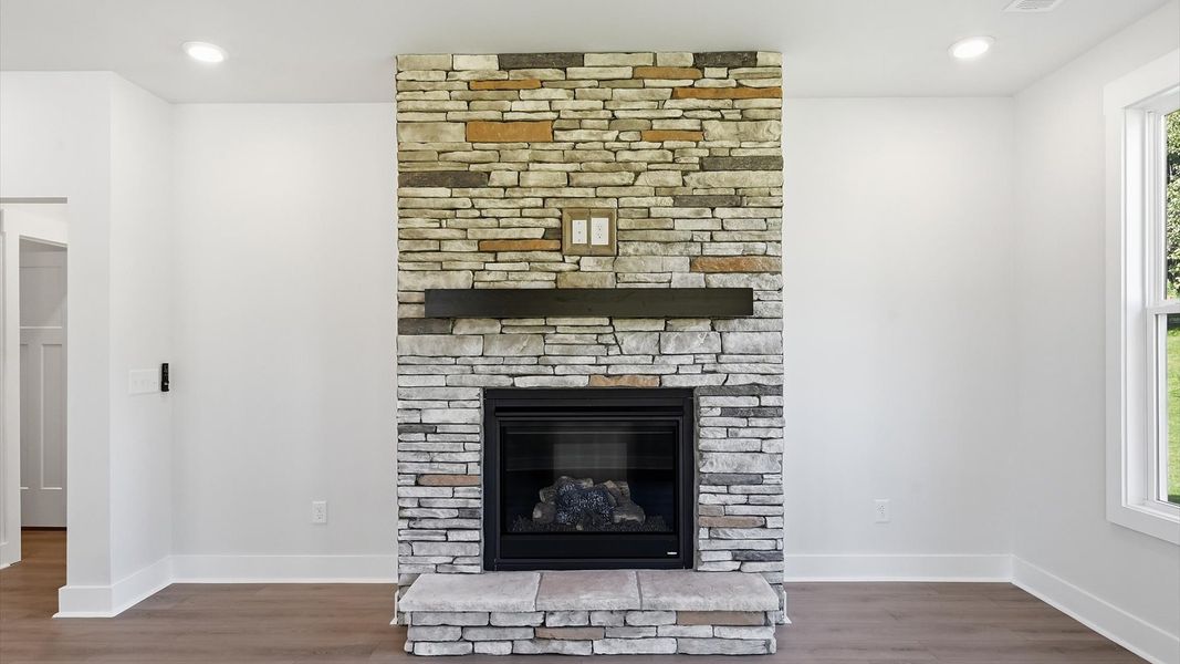 Notable family room designed with high standards—perfect for both everyday living and entertaining in Anderson, SC