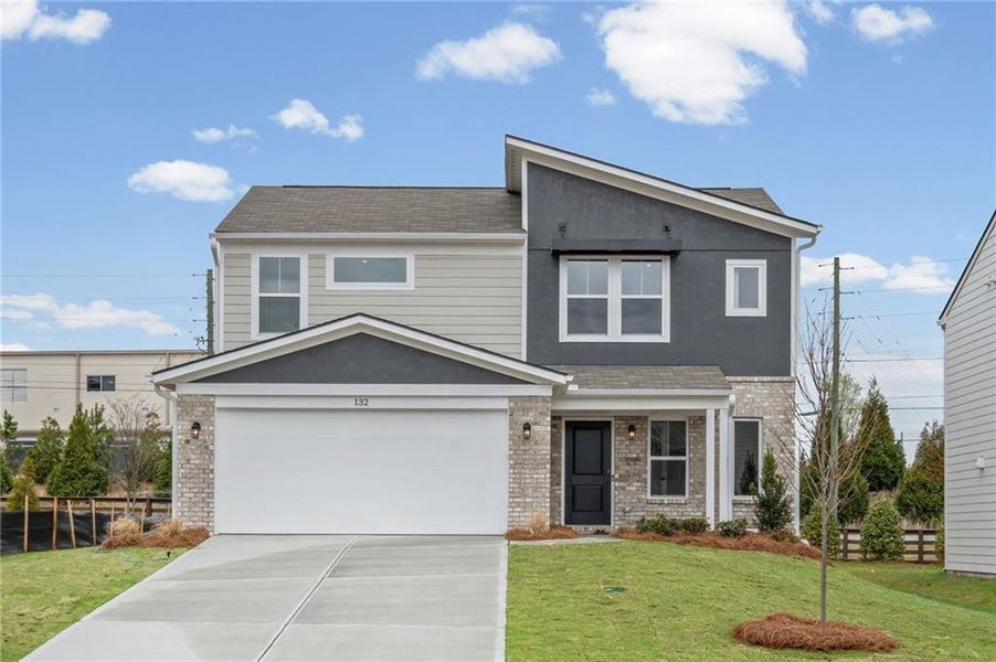 Front exterior of a new home in Crossvine Estates, Braselton, GA, highlighting curb appeal (Image 25).
