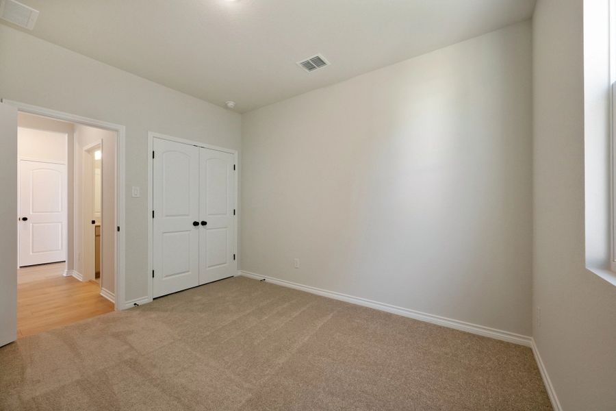 Spacious, unfurnished interior of a new home in The Homestead at Lariat, Liberty Hill (Image 35).