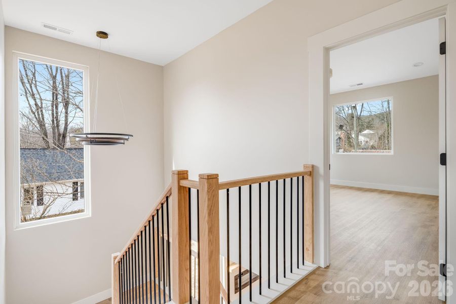 Spacious, unfurnished interior of a new home in , Black Mountain (Image 25).