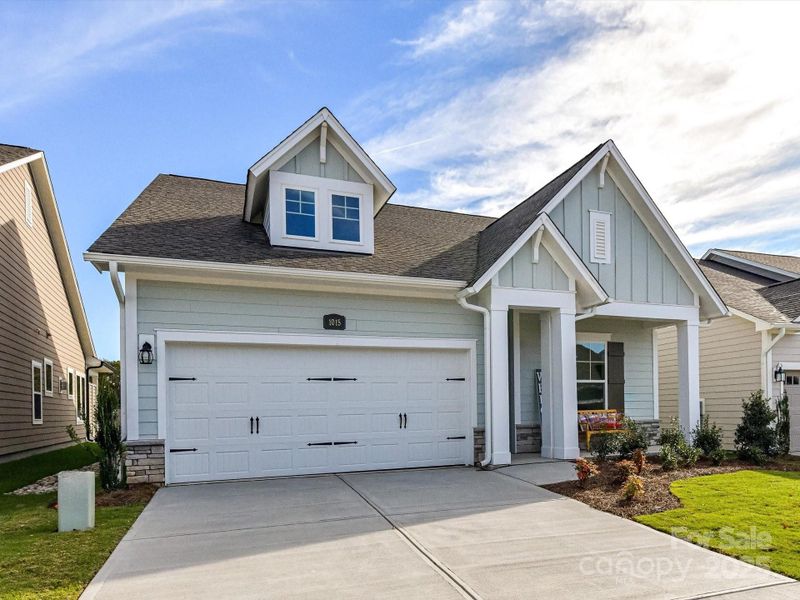 Front exterior of a new home in Encore at Streamside - Classic Series, Waxhaw, NC, highlighting curb appeal (Image 1).