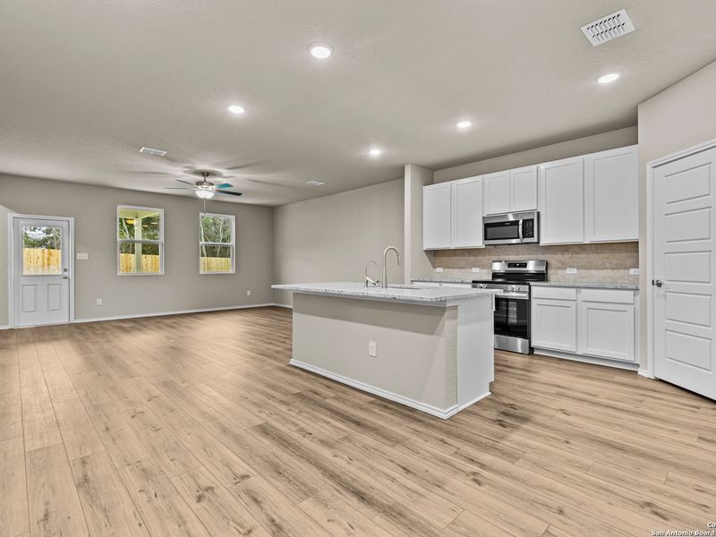 Furnished interior view inside a new home in Royal Crest, San Antonio (Image 6).