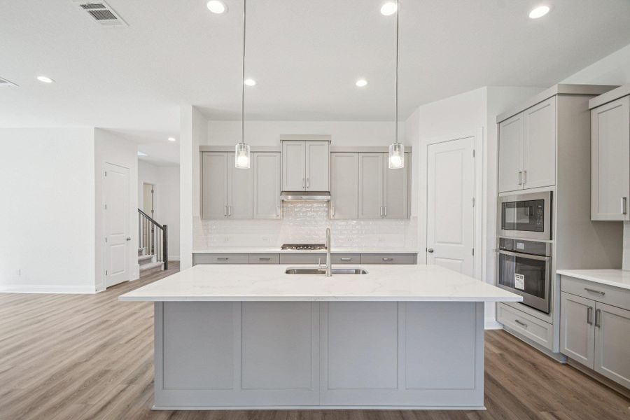 Furnished interior view inside a new home in 6 Creeks, Kyle (Image 6).