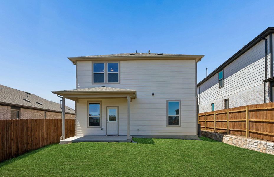 Exterior details and patio area of a home in Saddleback at Santa Rita Ranch, Liberty Hill (Image 3).