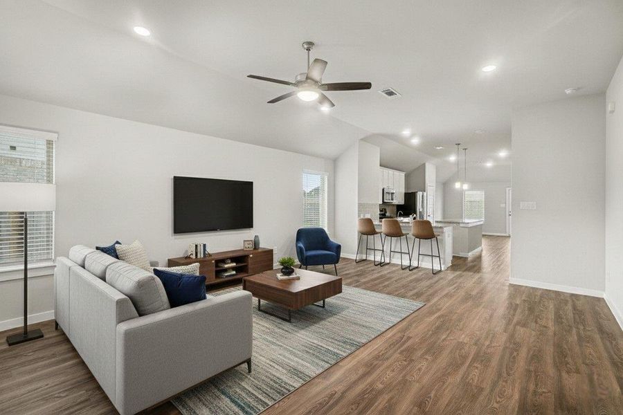 Stunning living room with high ceilings, natural light, and seamlessly flows into the kitchen! (Virtually Staged) Stunning living room with high ceilings, natural light, and seamlessly flows into the kitchen! (Virtually Staged)