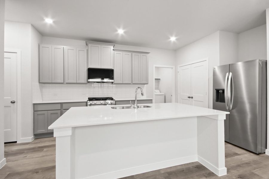 Furnished interior view inside a new home in Lakes at Black Oak, Magnolia (Image 10).