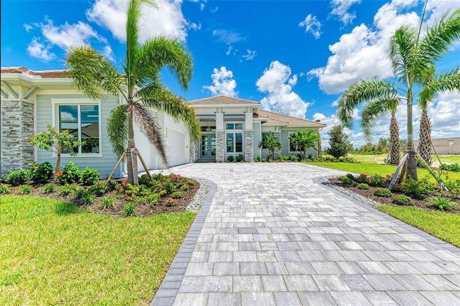 Front exterior of a new home in , Venice, FL, highlighting curb appeal (Image 18).