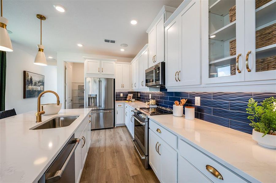 Furnished interior view inside a new home in Esplanade at Wellen Park, Englewood (Image 16).