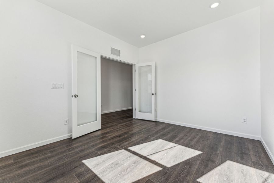 Representative unfurnished interior of a home built from the Sedalia by Taylor Morrison in Trailstone, Arvada (Image 34).