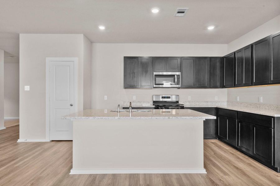 Furnished interior view inside a new home in Windrose Green, Angleton (Image 7).