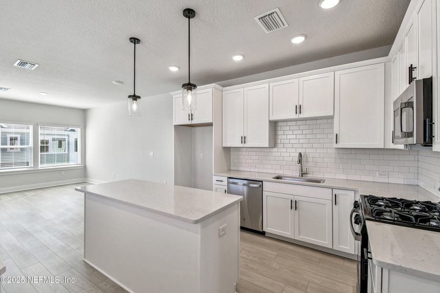 Furnished interior view inside a new home in Kettering at eTown - Garden Collection, Jacksonville (Image 4). Furnished interior view inside a new home in Kettering at eTown - Garden Collection, Jacksonville (Image 4).