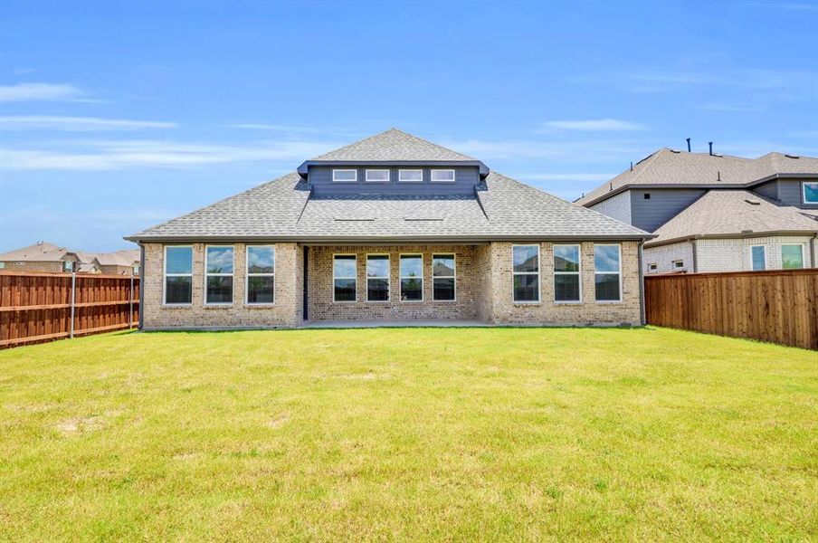 Exterior details and patio area of a home in Polo Ridge, Forney (Image 28).