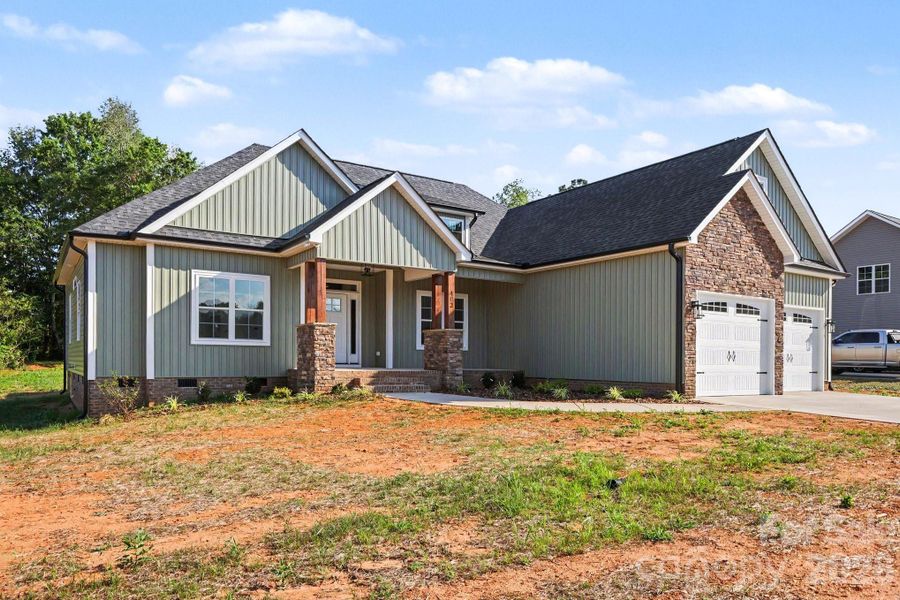 Front exterior of a new home in , China Grove, NC, highlighting curb appeal (Image 19). Front exterior of a new home in , China Grove, NC, highlighting curb appeal (Image 19).
