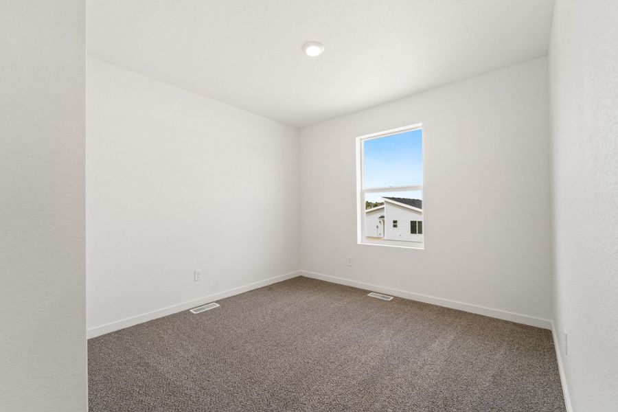 Spacious, unfurnished interior of a new home in Liberty Draw, Evans (Image 24).