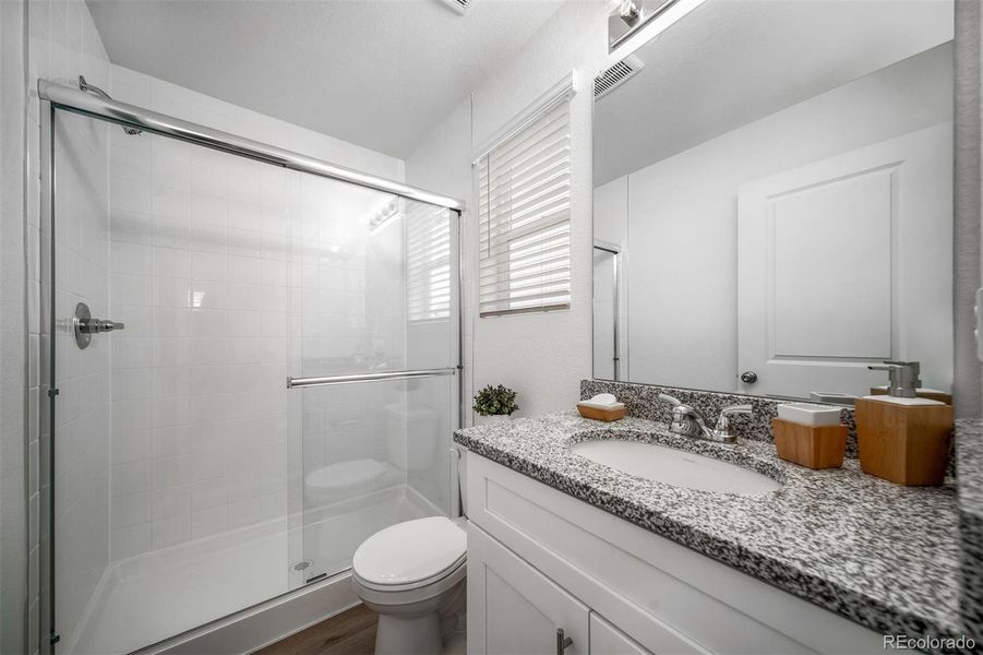 Furnished interior view inside a new home in Reunion, Commerce City (Image 26).