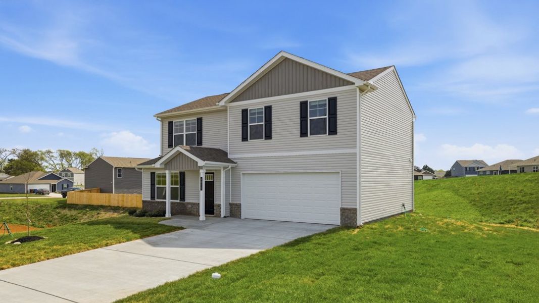 Front exterior of a new home in Battle Ridge, Jefferson City, TN, highlighting curb appeal (Image 2). Front exterior of a new home in Battle Ridge, Jefferson City, TN, highlighting curb appeal (Image 2).