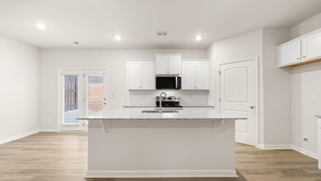 Furnished interior view inside a new home in Carlton, Douglasville (Image 4).