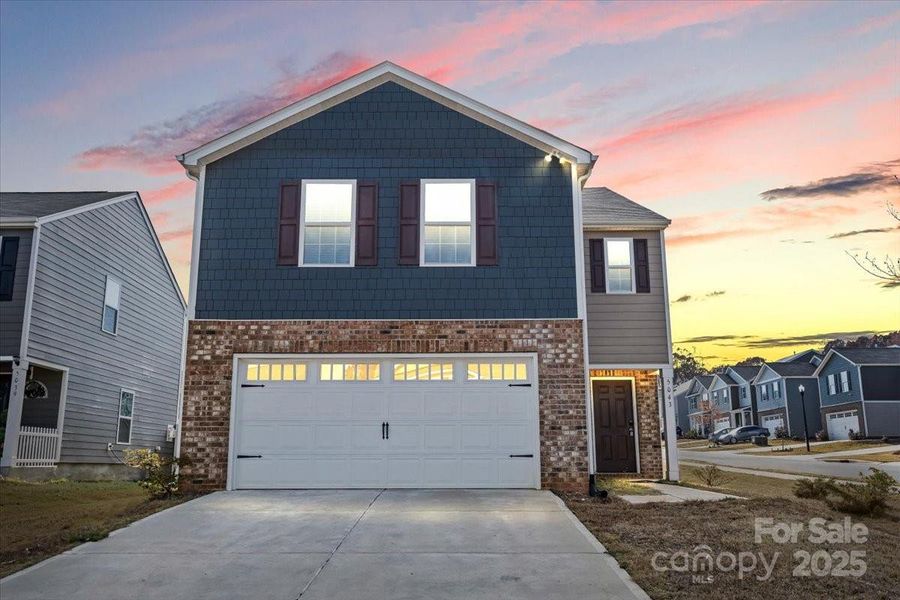 Front exterior of a new home in , York, SC, highlighting curb appeal (Image 1).